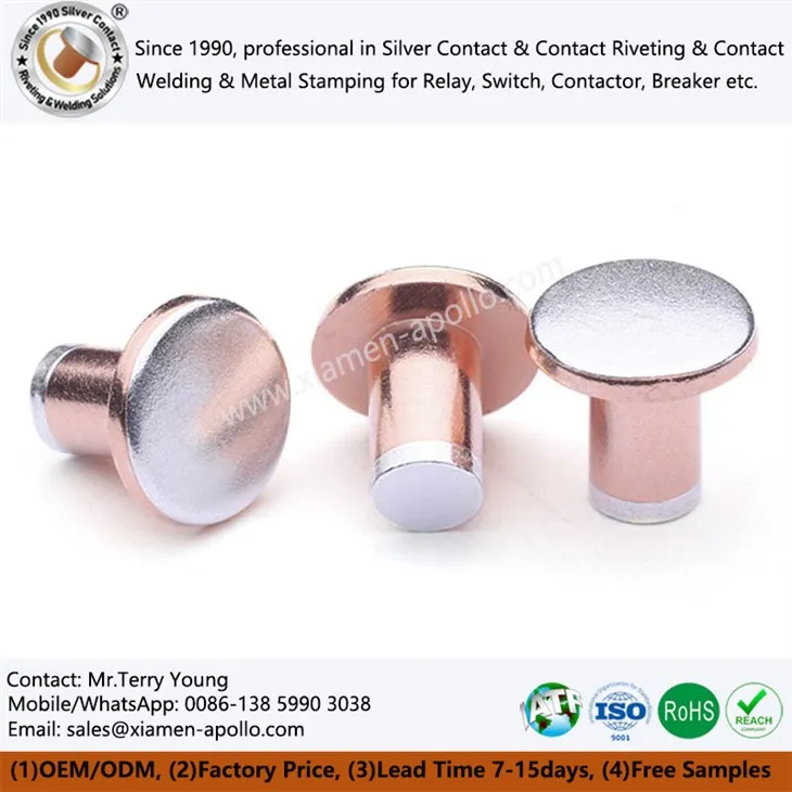 Kuntatti elettriċi tri-metal